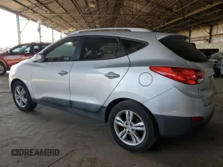2013 Hyundai Tucson GLS with VIN KM8JU3AC9DU656873, listed as a Copart auction lot 43783415 with 143,513 mi miles and Salvage Title. Bid and sale history available at carsss.com. Image 2.