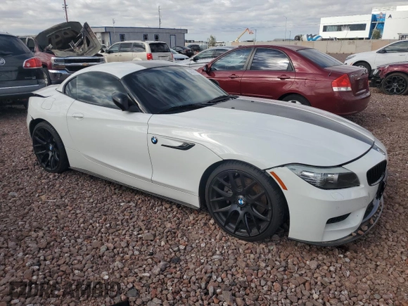 2012 BMW Z4 sDrive35i with VIN WBALM7C55CE385061, listed as a Copart auction lot 48051044 with 87,369 mi miles and Salvage Title. Bid and sale history available at carsss.com. Image 4.