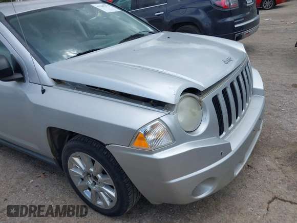 2007 Jeep Compass Sport with VIN 1J8FF47W97D279230, listed as a IAAI auction lot 42207379 with 205,058 mi miles and . Bid and sale history available at carsss.com. Image 6.