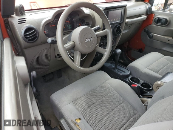 2009 Jeep Wrangler X z VIN 1J4FA24139L740959, wystawiony jako Copart lot #56509075 z przebiegiem 121 927 mil mil oraz Szkoda całkowita • Salvage title. Historia ofert i sprzedaży dostępna na DreamBid. Obrazek 8.