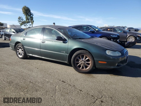 2001 Chrysler LHS z VIN 2C3AC56G31H606648, wystawiony jako Copart lot #77123814 z przebiegiem 83 574 mil mil oraz Tytuł czysty. Historia ofert i sprzedaży dostępna na DreamBid. Obrazek 4.