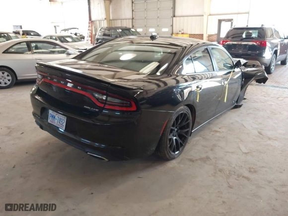 2016 Dodge Charger SXT with VIN 2C3CDXHGXGH166774, listed as a IAAI auction lot 41771461 with 187,660 mi miles. Bid and sale history available at carsss.com. Image 4.