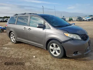 2011 Toyota Sienna LE AAS with VIN 5TDKK3DC7BS171627, listed as a Copart auction lot 64001605 with 130,748 mi miles and Salvage title. Bid and sale history available at DreamBid. Image 4.