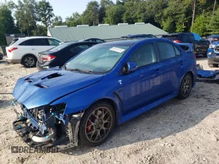2015 Mitsubishi Lancer Evolution Final Edition z VIN JA32W7FV7FU608214, wystawiony jako Copart lot #68316174 z przebiegiem 56 714 mil mil oraz Szkody całkowita. Historia ofert i sprzedaży dostępna na DreamBid. Obrazek 1.