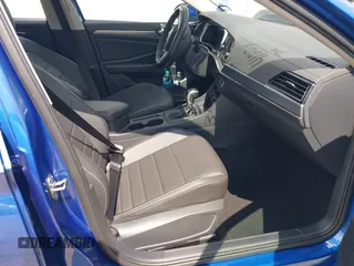 2024 Volkswagen Jetta SE with VIN 3VWEM7BU9RM007894, listed as a IAAI auction lot 42116799 with 35,023 mi miles and . Bid and sale history available at DreamBid. Image 5.