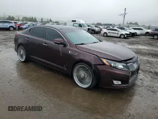2014 Kia Optima EX with VIN 5XXGN4A79EG329448, listed as a Copart auction lot 50991095 with 103,879 mi miles and Salvage Title. Bid and sale history available at carsss.com. Image 4.