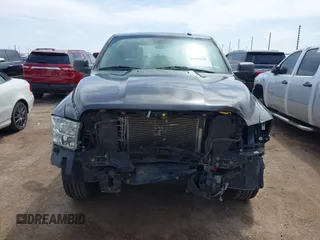 2021 Ram 1500 Tradesman z VIN 3C6RR6KG9MG563230, wystawiony jako IAAI lot #41905688 z przebiegiem 81 143 mil mil oraz . Historia ofert i sprzedaży dostępna na DreamBid. Obrazek 13.