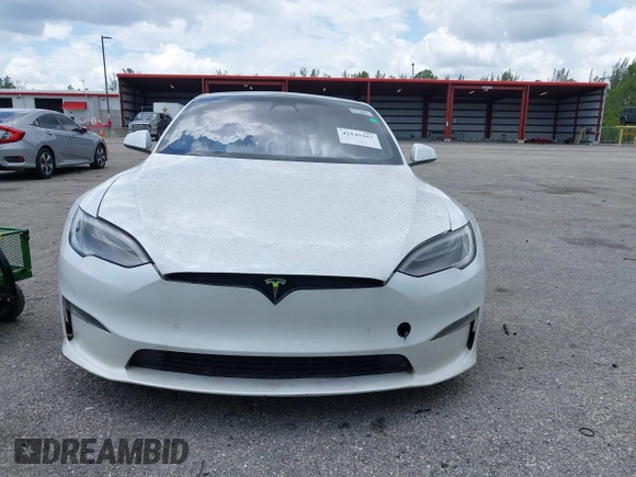 2022 Tesla Model S Plaid with VIN 5YJSA1E61NF460155, listed as a IAAI auction lot 42545167 with 51,711 mi miles and . Bid and sale history available at DreamBid. Image 12.