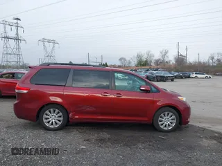 2013 Toyota Sienna XLE with VIN 5TDDK3DC1DS068215, listed as a IAAI auction lot 41610737 with 168,186 mi miles and . Bid and sale history available at DreamBid. Image 13.