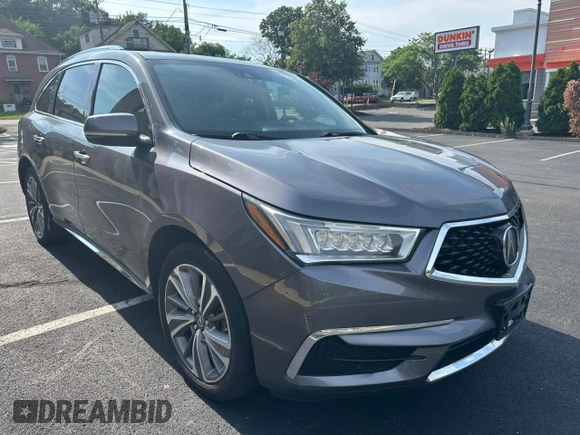 2018 Acura MDX Technology with VIN 5J8YD4H53JL020565, listed as a Copart auction lot 64906135 with 205,899 mi miles and Clean title. Bid and sale history available at DreamBid. Image 4.