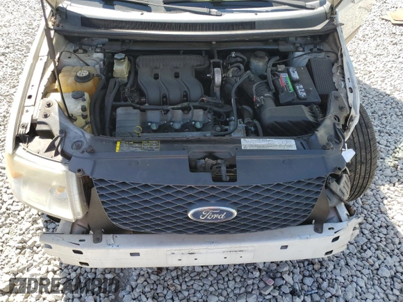 2005 Ford Freestyle SEL z VIN 1FMZK02185GA31840, wystawiony jako Copart lot #53802915 z przebiegiem 164 791 mil mil oraz Szkoda całkowita • Salvage title. Historia ofert i sprzedaży dostępna na DreamBid. Obrazek 12.