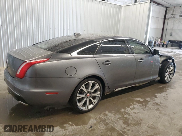 2019 Jaguar XJ Portfolio with VIN SAJWA2G71K8W19797, listed as a Copart auction lot 54133195 with 57,446 mi miles and Salvage Title. Bid and sale history available at DreamBid. Image 3.