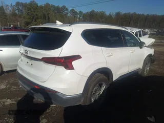 2021 Hyundai Santa Fe SEL z VIN 5NMS24AJ5MH340722, wystawiony jako IAAI lot #38331843 z przebiegiem 85 052 mil mil oraz . Historia ofert i sprzedaży dostępna na DreamBid. Obrazek 4.