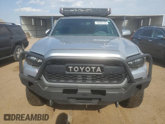 2017 Toyota Tacoma SR5 with VIN 5TFSZ5AN4HX047041, listed as a Copart auction lot 63424145 with 191,335 mi miles and Salvage title. Bid and sale history available at DreamBid. Image 5.