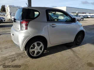 2015 Scion iQ with VIN JTNJJXB01FJ030680, listed as a Copart auction lot 46949235 with 27,509 mi miles and Salvage Title. Bid and sale history available at carsss.com. Image 3.