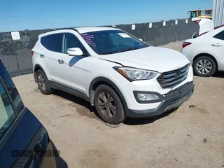 2016 Hyundai Santa Fe z VIN 5XYZU3LB0GG355412, wystawiony jako IAAI lot #41700993 z przebiegiem 105 314 mil mil oraz . Historia ofert i sprzedaży dostępna na DreamBid. Obrazek 1.