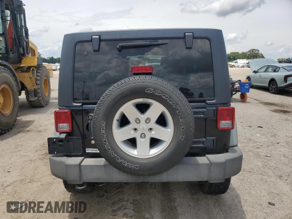 2012 Jeep Wrangler Unlimited Sport z VIN 1C4BJWDG4CL243538, wystawiony jako Copart lot #58826675 z przebiegiem 126 646 mil mil oraz Szkoda całkowita • Salvage title. Historia ofert i sprzedaży dostępna na DreamBid. Obrazek 6.