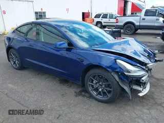 2021 Tesla Model 3 Standard Range Plus z VIN 5YJ3E1EA1MF094693, wystawiony jako IAAI lot #42083700 z przebiegiem 79 222 mil mil oraz . Historia ofert i sprzedaży dostępna na DreamBid. Obrazek 1.