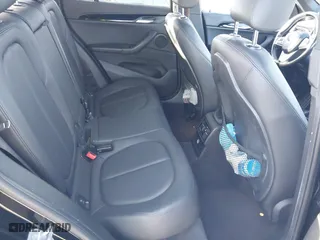 2017 BMW X1 xDrive28i with VIN WBXHT3C37H5F82992, listed as a IAAI auction lot 41293740 with 161,418 mi miles. Bid and sale history available at carsss.com. Image 8.