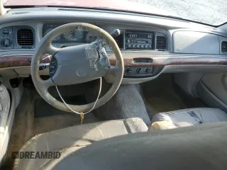 1997 Mercury Grand Marquis GS z VIN 2MELM74W1VX611803, wystawiony jako Copart lot #54315505 z przebiegiem 156 152 mil mil oraz Szkoda całkowita • Salvage title. Historia ofert i sprzedaży dostępna na DreamBid. Obrazek 8.