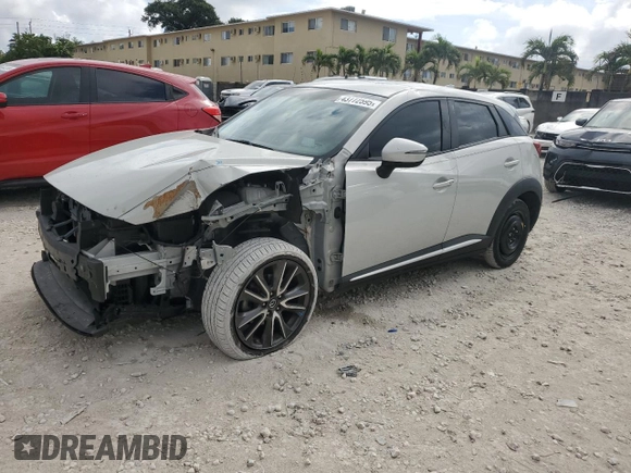 2017 Mazda CX-3 Grand Touring with VIN JM1DKFD76H0170333, listed as a Copart auction lot 43772595 with 59,693 mi miles and Salvage Title. Bid and sale history available at carsss.com. Image 1.