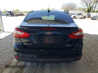 2014 Ford Focus SE with VIN 1FADP3F25EL460855, listed as a Copart auction lot 52911945 with 140,181 mi miles and Salvage Title. Bid and sale history available at DreamBid. Image 6.