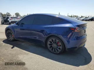 2021 Tesla Model Y Performance z VIN 5YJYGDEF0MF157795, wystawiony jako Copart lot #57163245 z przebiegiem 62 598 mil mil oraz Szkoda całkowita • Salvage title. Historia ofert i sprzedaży dostępna na DreamBid. Obrazek 2.
