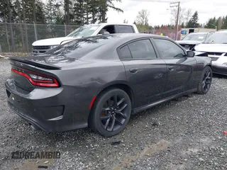 2019 Dodge Charger GT with VIN 2C3CDXHG1KH714119, listed as a IAAI auction lot 41885794 with 100,063 mi miles and . Bid and sale history available at DreamBid. Image 4.