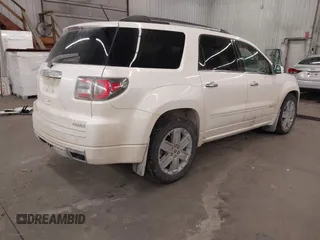 2014 GMC Acadia Denali with VIN 1GKKVTKD4EJ238869, listed as a IAAI auction lot 41957229 with 182,189 mi miles and . Bid and sale history available at carsss.com. Image 4.