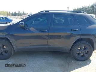 2015 Jeep Cherokee North with VIN 1C4PJMCS3FW777973, listed as a IAAI auction lot 42043203 with 158,536 mi miles. Bid and sale history available at carsss.com. Image 15.