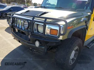 2003 Hummer H2 z VIN 5GRGN23UX3H124727, wystawiony jako IAAI lot #41697787 z przebiegiem 241 554 mil mil oraz . Historia ofert i sprzedaży dostępna na DreamBid. Obrazek 6.
