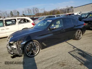 2020 BMW 5 Series M550i xDrive z VIN WBAJS7C03LCE17957, wystawiony jako Copart lot #85237844 z przebiegiem 49 301 mil mil oraz Szkoda całkowita • Salvage title. Historia ofert i sprzedaży dostępna na DreamBid. Obrazek 1.