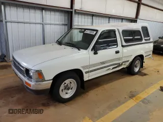 1993 Toyota Pickup with VIN 4TARN81A7PZ140577, listed as a Copart auction lot 61718835 with 206,124 mi miles and Salvage title. Bid and sale history available at DreamBid. Image 1.