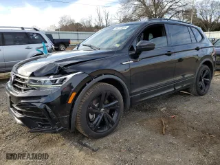 2023 Volkswagen Tiguan SE R-Line Black with VIN 3VVCB7AX9PM131559, listed as a Copart auction lot 44711665 with 28,166 mi miles and Salvage Title. Bid and sale history available at carsss.com. Image 1.