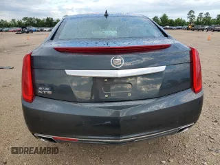 2013 Cadillac XTS Luxury z VIN 2G61P5S33D9217027, wystawiony jako Copart lot #56358835 z przebiegiem 82 644 mil mil oraz Szkoda całkowita • Salvage title. Historia ofert i sprzedaży dostępna na DreamBid. Obrazek 6.