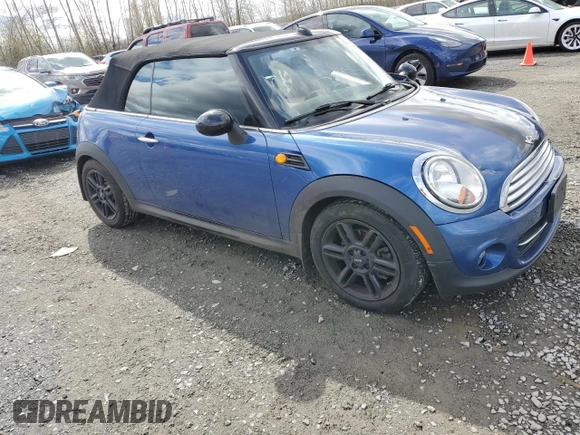 2014 MINI Convertible with VIN WMWZN3C55ET861078, listed as a Copart auction lot 50240665 with 50,541 mi miles and Salvage Title. Bid and sale history available at DreamBid. Image 4.