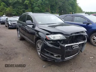 2015 Audi Q7 Premium Plus with VIN WA1LGAFEXFD028885, listed as a IAAI auction lot 42619526 with 145,126 mi miles and . Bid and sale history available at DreamBid. Image 1.