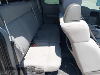 2006 Ford F-150 STX with VIN 1FTRX12W46KC84403, listed as a IAAI auction lot 41990451 with 243,606 mi miles. Bid and sale history available at carsss.com. Image 8.