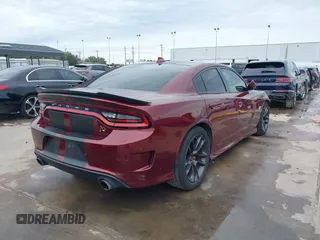 2020 Dodge Charger Scat Pack z VIN 2C3CDXGJ8LH132985, wystawiony jako IAAI lot #41316849 z przebiegiem 66 881 mil mil oraz . Historia ofert i sprzedaży dostępna na DreamBid. Obrazek 4.