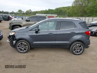 2021 Ford EcoSport Titanium z VIN MAJ6S3KL5MC452064, wystawiony jako IAAI lot #42049689 z przebiegiem 66 056 mil mil oraz . Historia ofert i sprzedaży dostępna na DreamBid. Obrazek 14.
