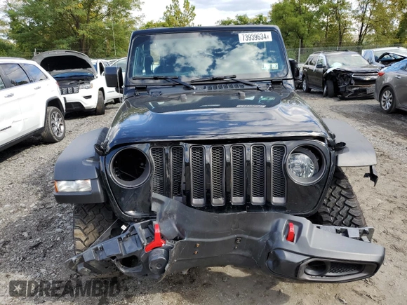 2023 Jeep Wrangler Rubicon with VIN 1C4HJXCGXPW545938, listed as a Copart auction lot 73939634 with 13,590 mi miles and Salvage title. Bid and sale history available at DreamBid. Image 5.