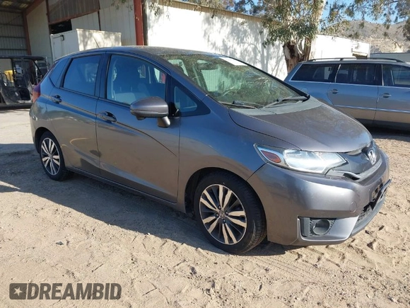 2015 Honda Fit EX-L with VIN 3HGGK5H88FM772964, listed as a IAAI auction lot 42020142 with 154,799 mi miles. Bid and sale history available at carsss.com. Image 1.