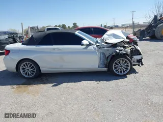 2015 BMW 2 Series 228i with VIN WBA1K5C50FV474011, listed as a IAAI auction lot 41805879 with 83,489 mi miles. Bid and sale history available at carsss.com. Image 12.