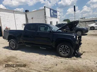 2020 Toyota Tacoma SR5 with VIN 3TMDZ5BN8LM090576, listed as a Copart auction lot 62217495 with 29,996 mi miles and Salvage title. Bid and sale history available at DreamBid. Image 13.