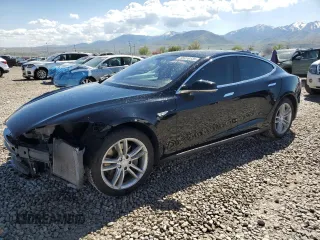 2014 Tesla Model S 60 with VIN 5YJSA1H18EFP34998, listed as a Copart auction lot 55416135 with 229,107 mi miles and Salvage title. Bid and sale history available at DreamBid. Image 1.