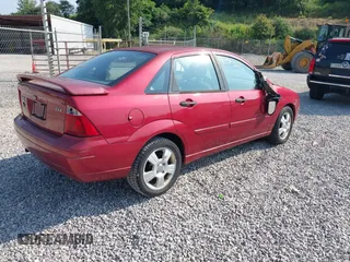 2005 Ford Focus S with VIN 1FAFP34N65W272608, listed as a IAAI auction lot 42573272 with 132,102 mi miles and . Bid and sale history available at DreamBid. Image 4.