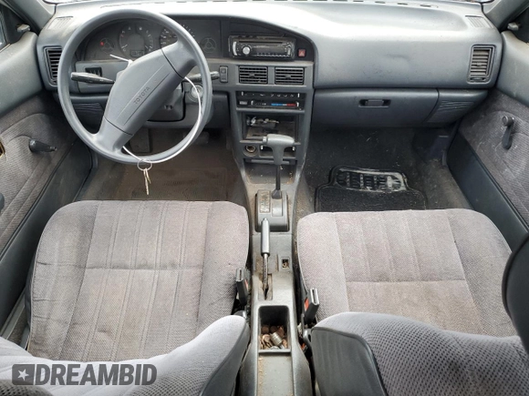 1991 Toyota Corolla z VIN 1NXAE94A8MZ234510, wystawiony jako Copart lot #75002404 z przebiegiem 188 051 mil mil oraz Szkoda całkowita • Salvage title. Historia ofert i sprzedaży dostępna na DreamBid. Obrazek 8.