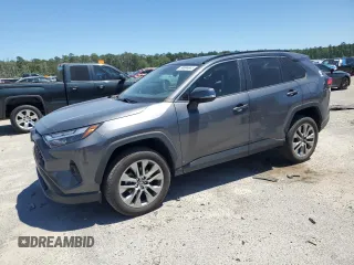 2022 Toyota RAV4 XLE Premium with VIN 2T3C1RFV1NC213187, listed as a Copart auction lot 58094665 with 28,947 mi miles and Salvage title. Bid and sale history available at DreamBid. Image 1.