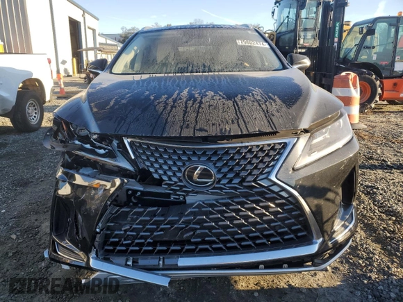 2021 Lexus RX 350L with VIN JTJHZKEA1M2021324, listed as a Copart auction lot 79802474 with 84,221 mi miles and Salvage title. Bid and sale history available at DreamBid. Image 5.
