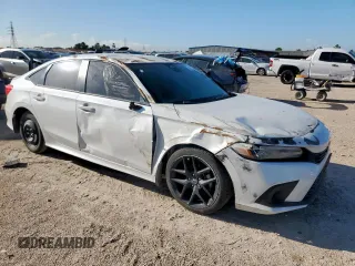 2023 Honda Civic Sport with VIN 2HGFE2F57PH511027, listed as a Copart auction lot 62703695 with 33,899 mi miles and Salvage title. Bid and sale history available at DreamBid. Image 4.